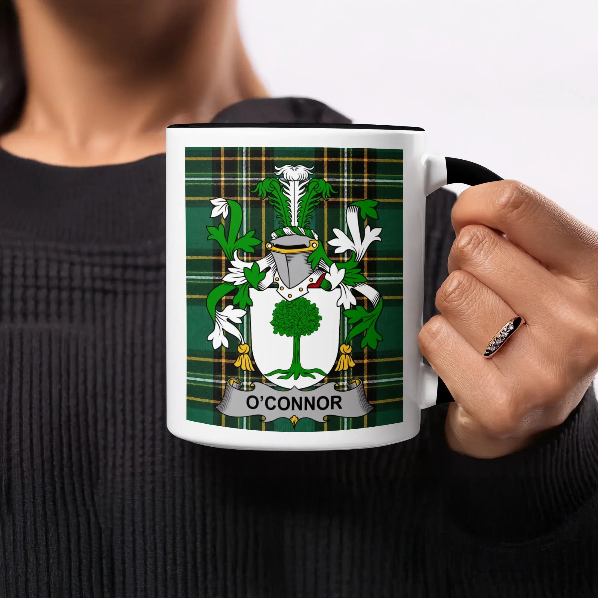 Mug with O'Connor crest featuring a green plaid background and a tree.
