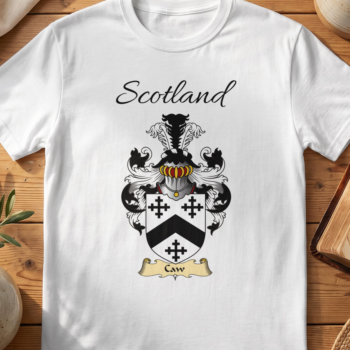 White Caw Scottish family shield T-shirt featuring a black chevron between black crosses