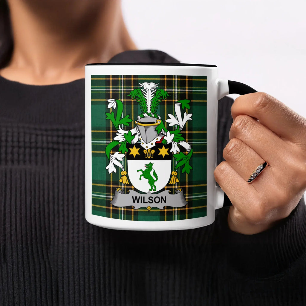 Mug with Wilson family crest on green tartan background.