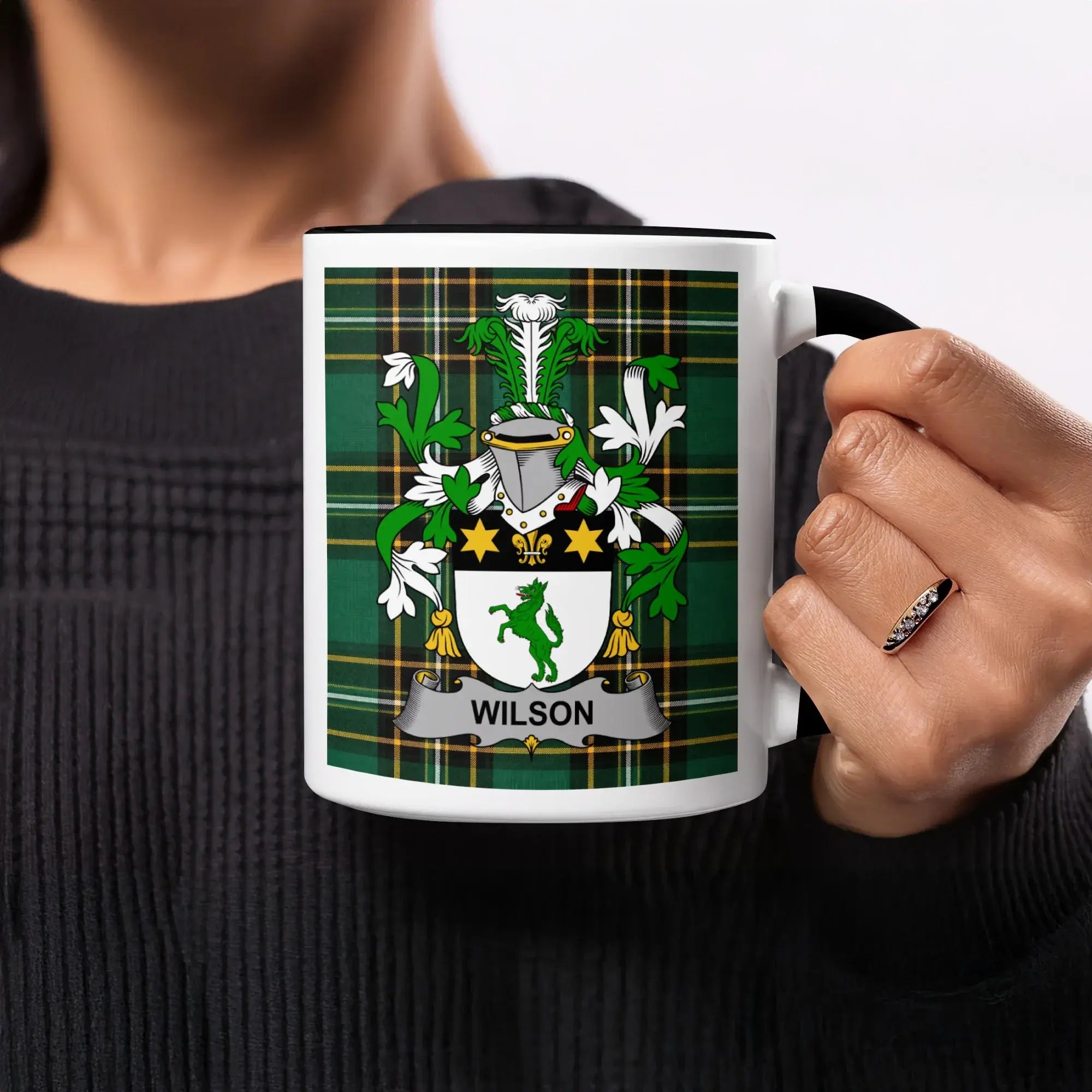 Mug with Wilson family crest on green tartan background.