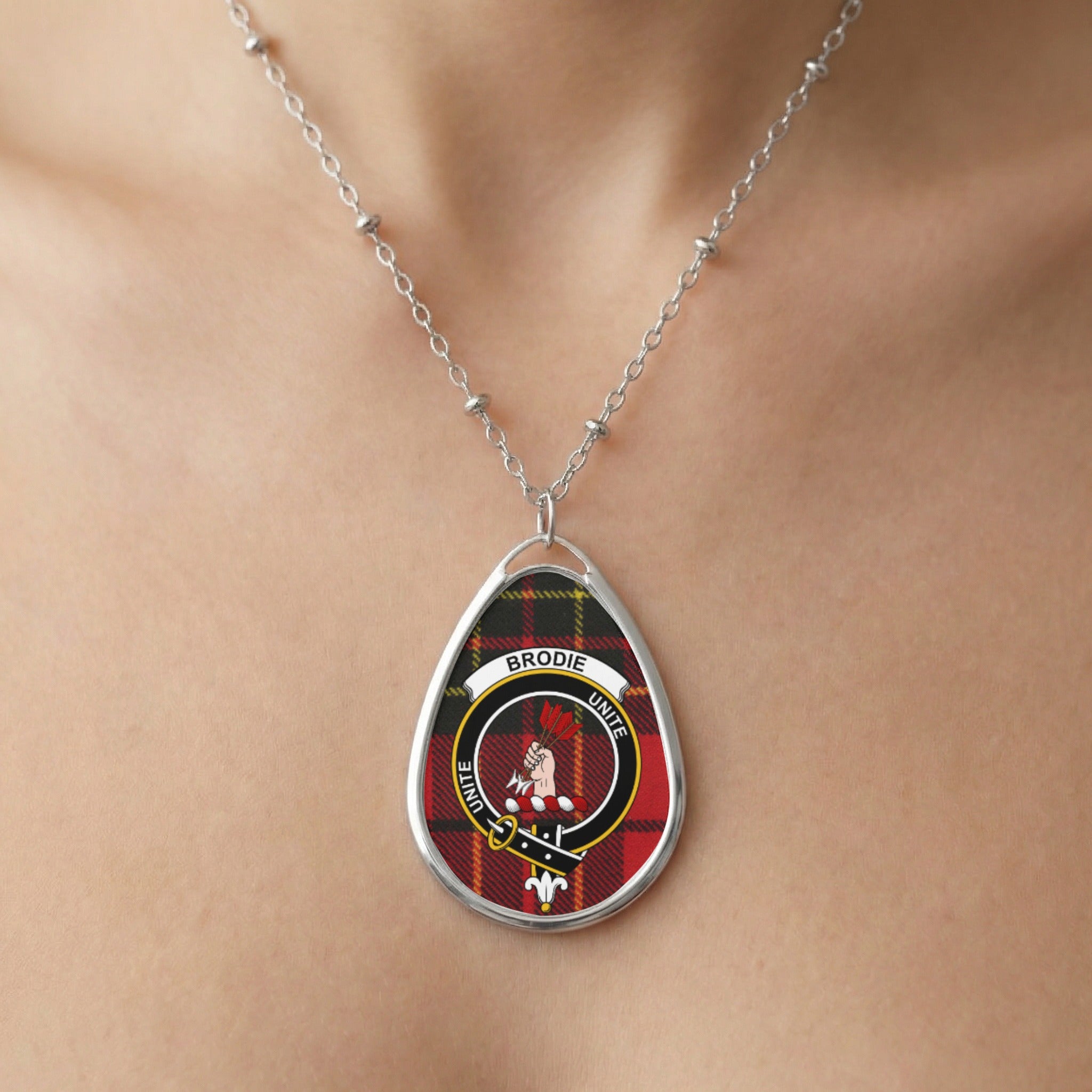Close-up of Brodie clan tartan pendant necklace with crest design