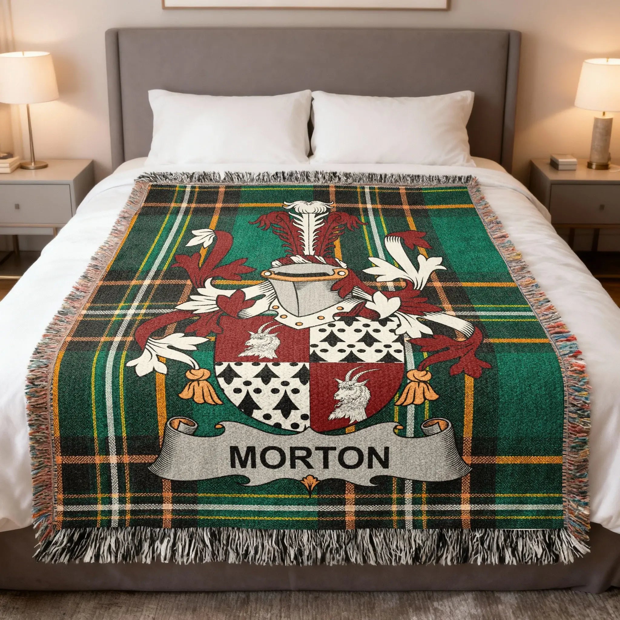 Green tartan blanket with a coat of arms featuring the name "Morton".