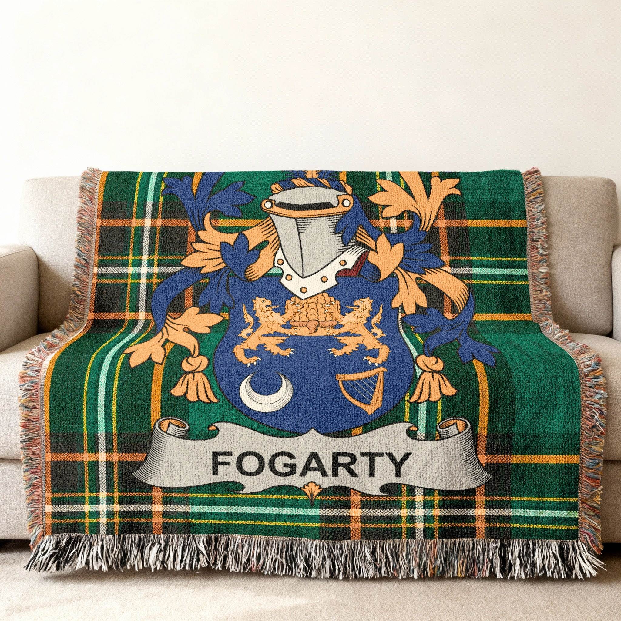 Fogarty family crest on a green plaid throw blanket.