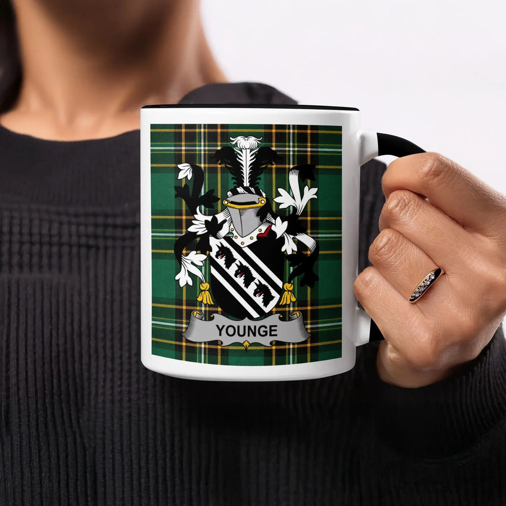 Mug with the Younge family crest on a tartan background.