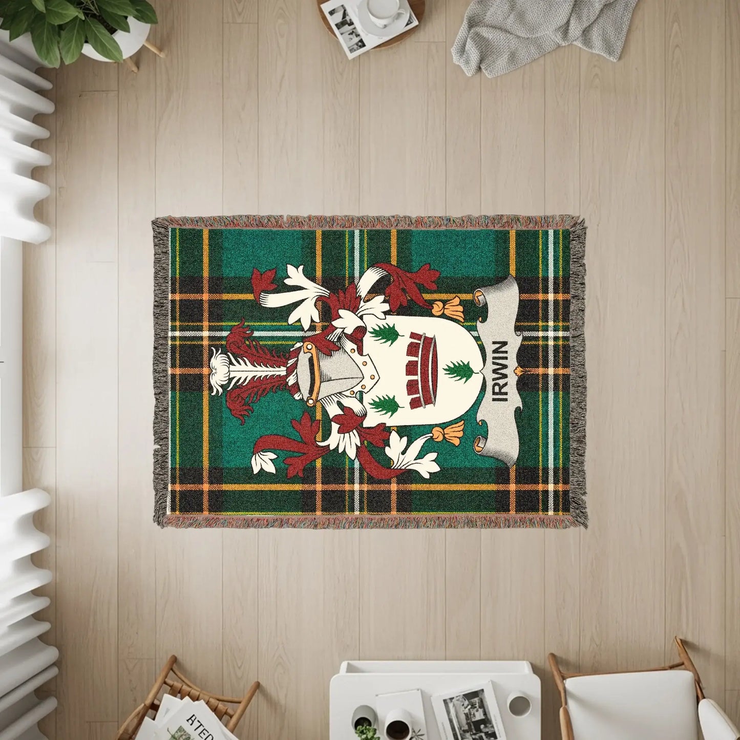 Irwin family crest on a plaid woven throw blanket.