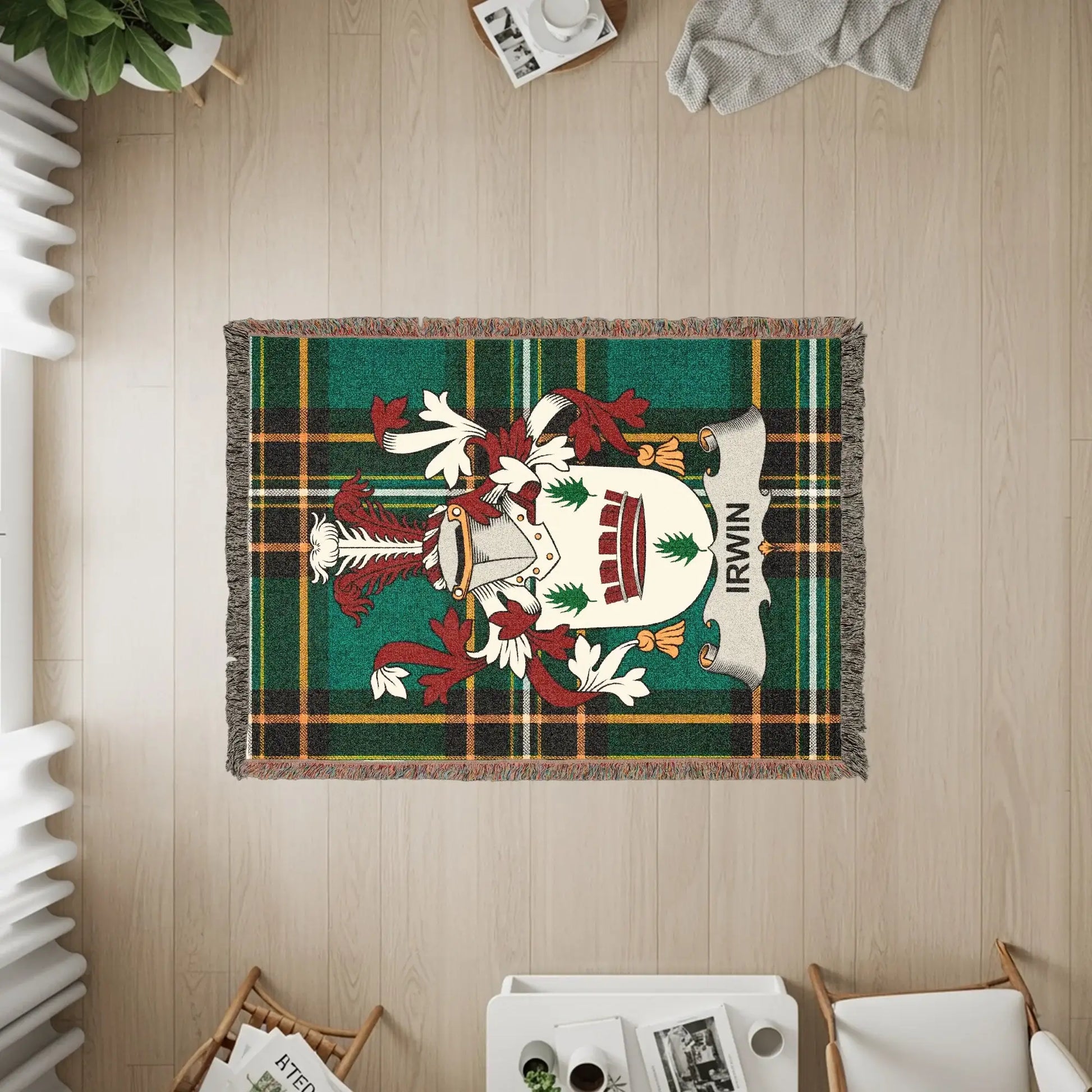 Irwin family crest on a plaid woven throw blanket.