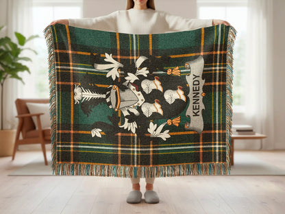 Green and black plaid blanket with a crest and "Kennedy" text.
