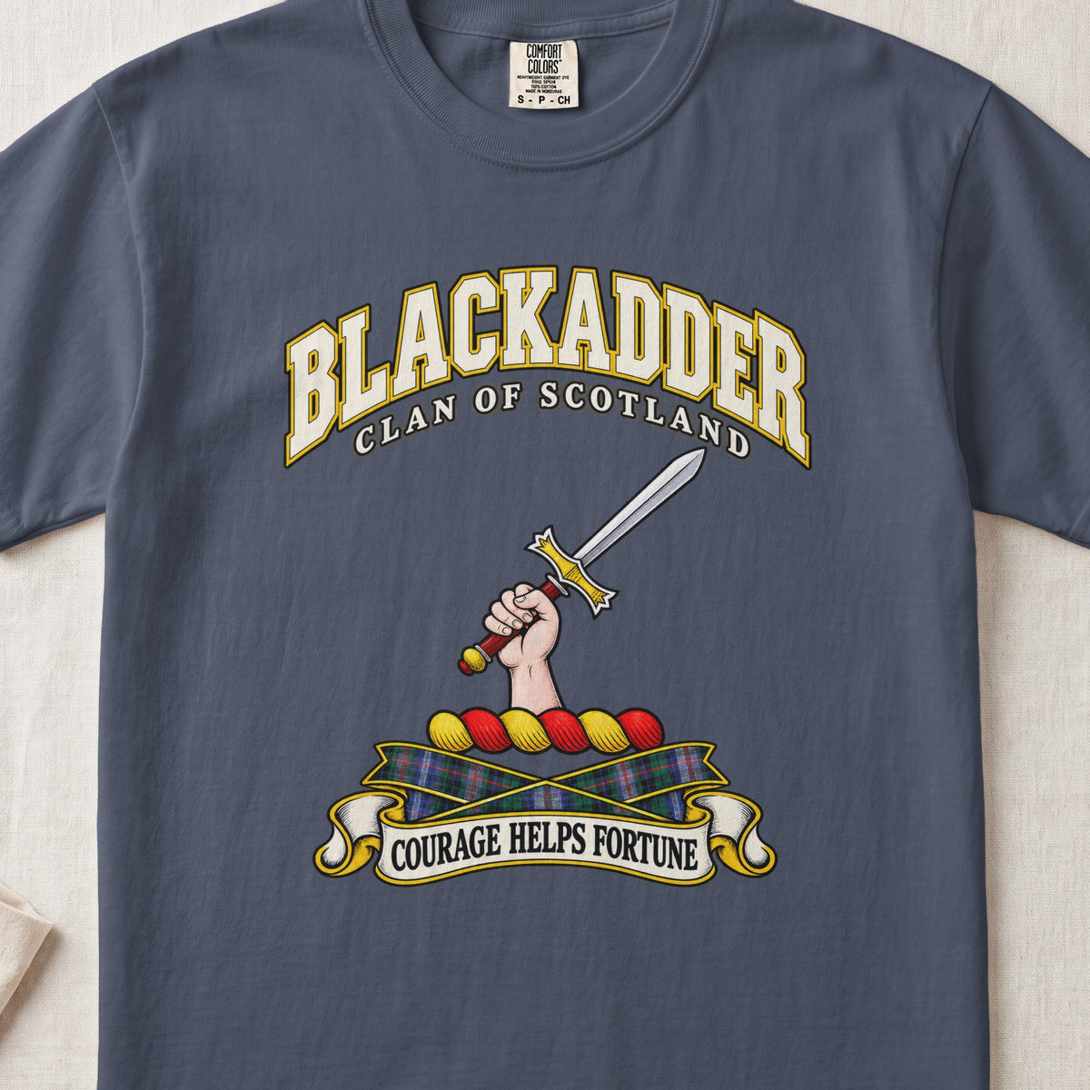 Blackadder Scottish clan T-shirt in Midnight, front view with a hand holding a raised sword and motto banner.