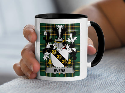White mug with black rim displaying a coat of arms with the name "EVERS".