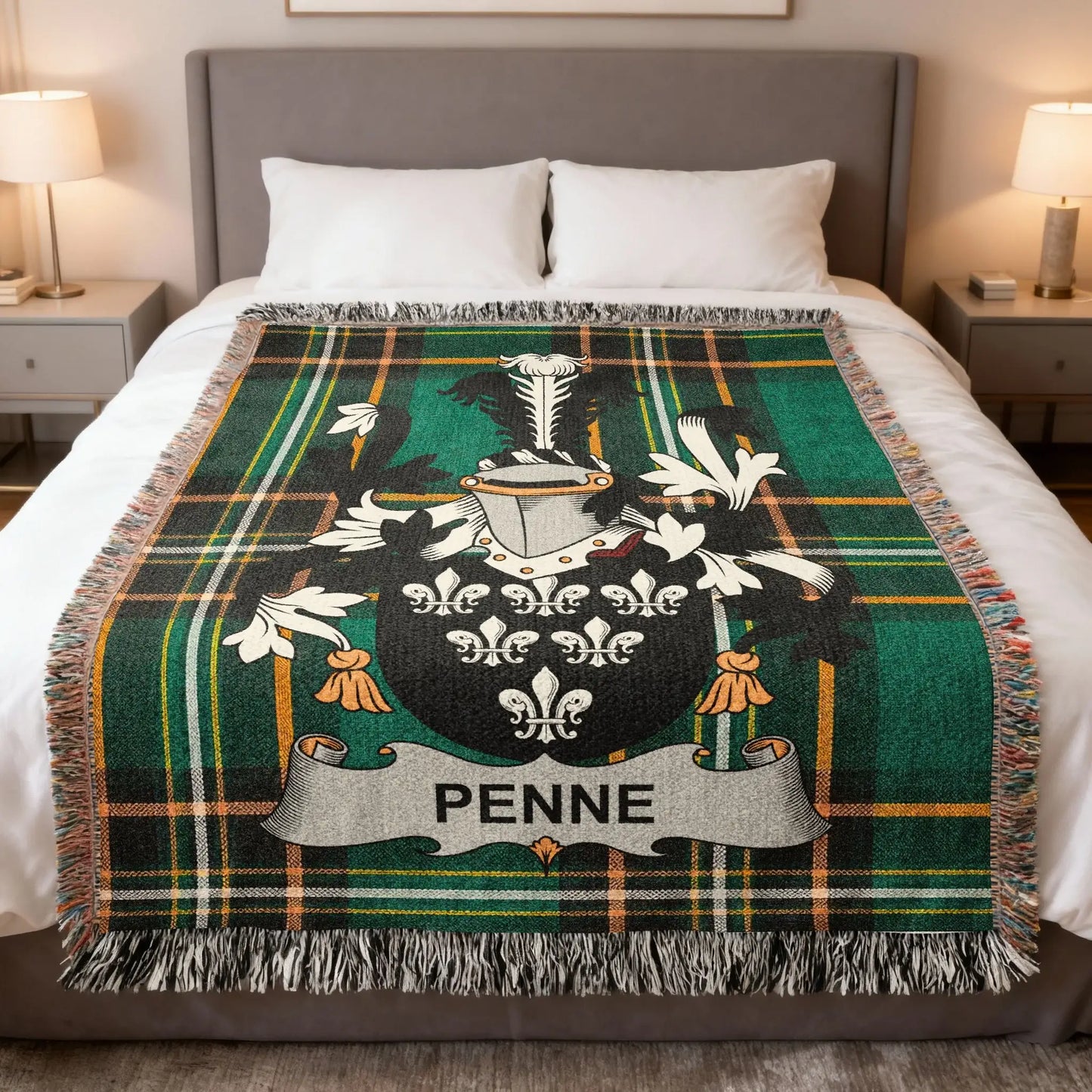 Tartan blanket with green and black plaid and a family crest bearing the name PENNE.