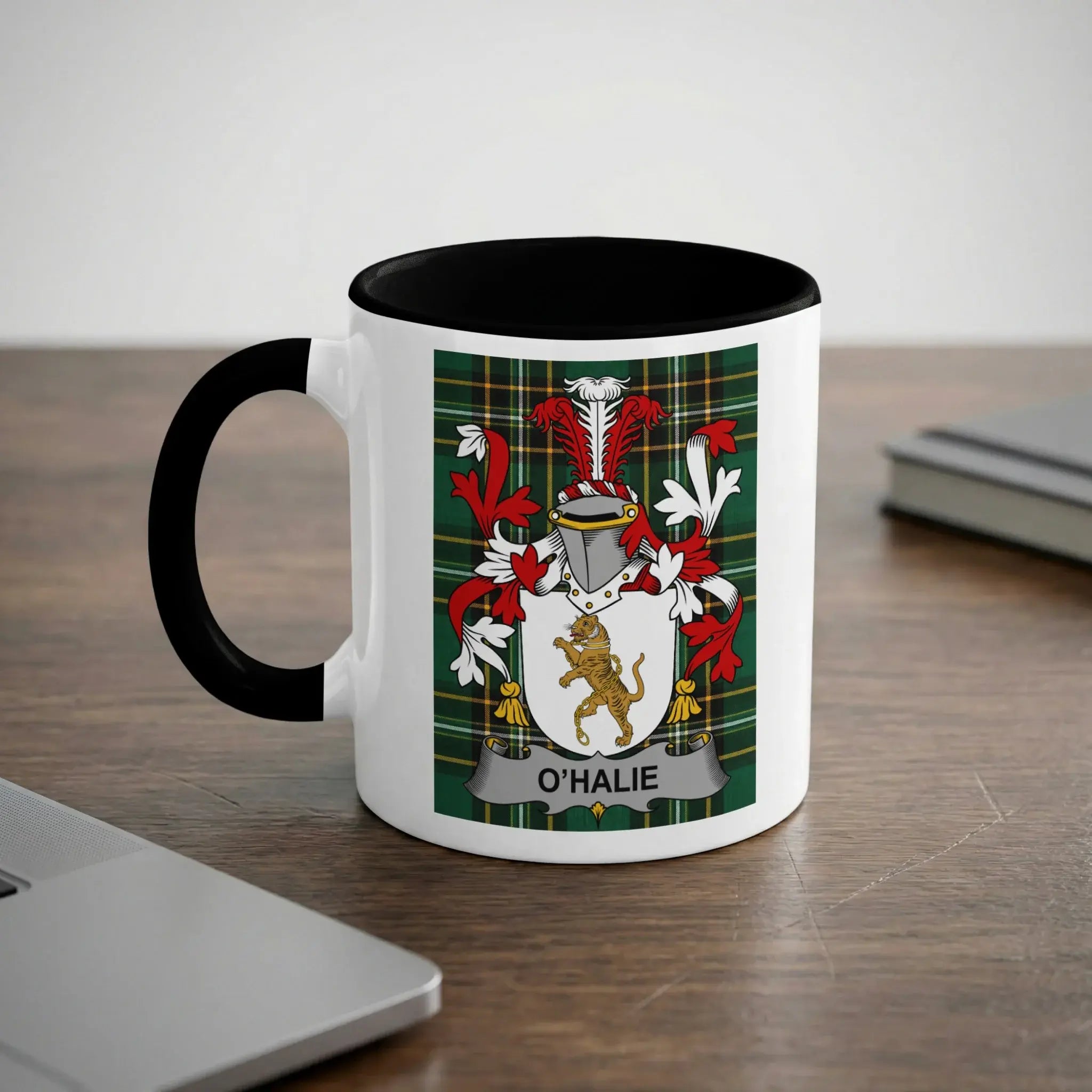 O'HALIE coat of arms on a white mug with black rim and handle.