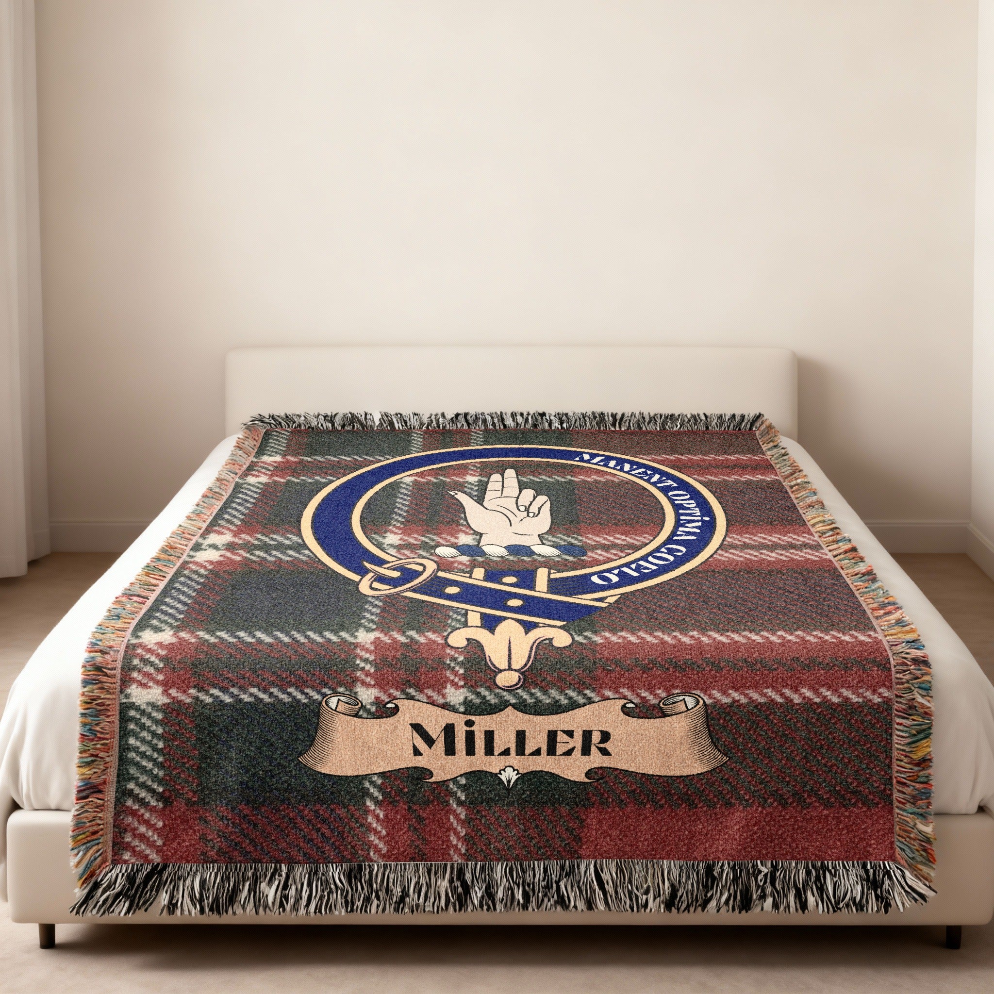 Miller family crest woven into tartan blanket — close-up detail