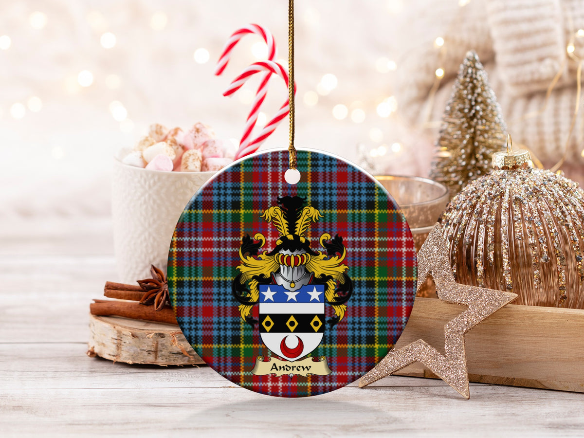 Andrew family emblem ceramic Christmas ornament with Caledonia tartan background in festive holiday décor