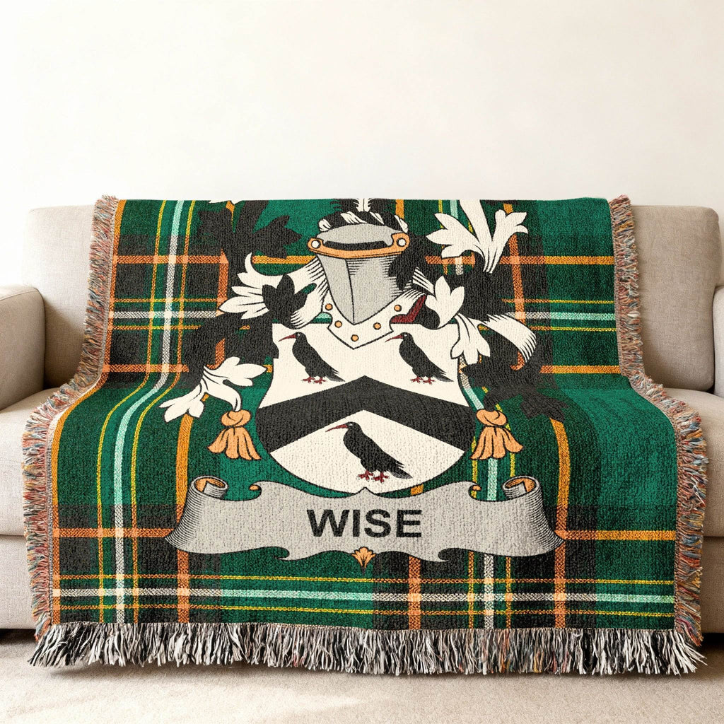 Green tartan blanket with Wise family crest and the name "WISE".