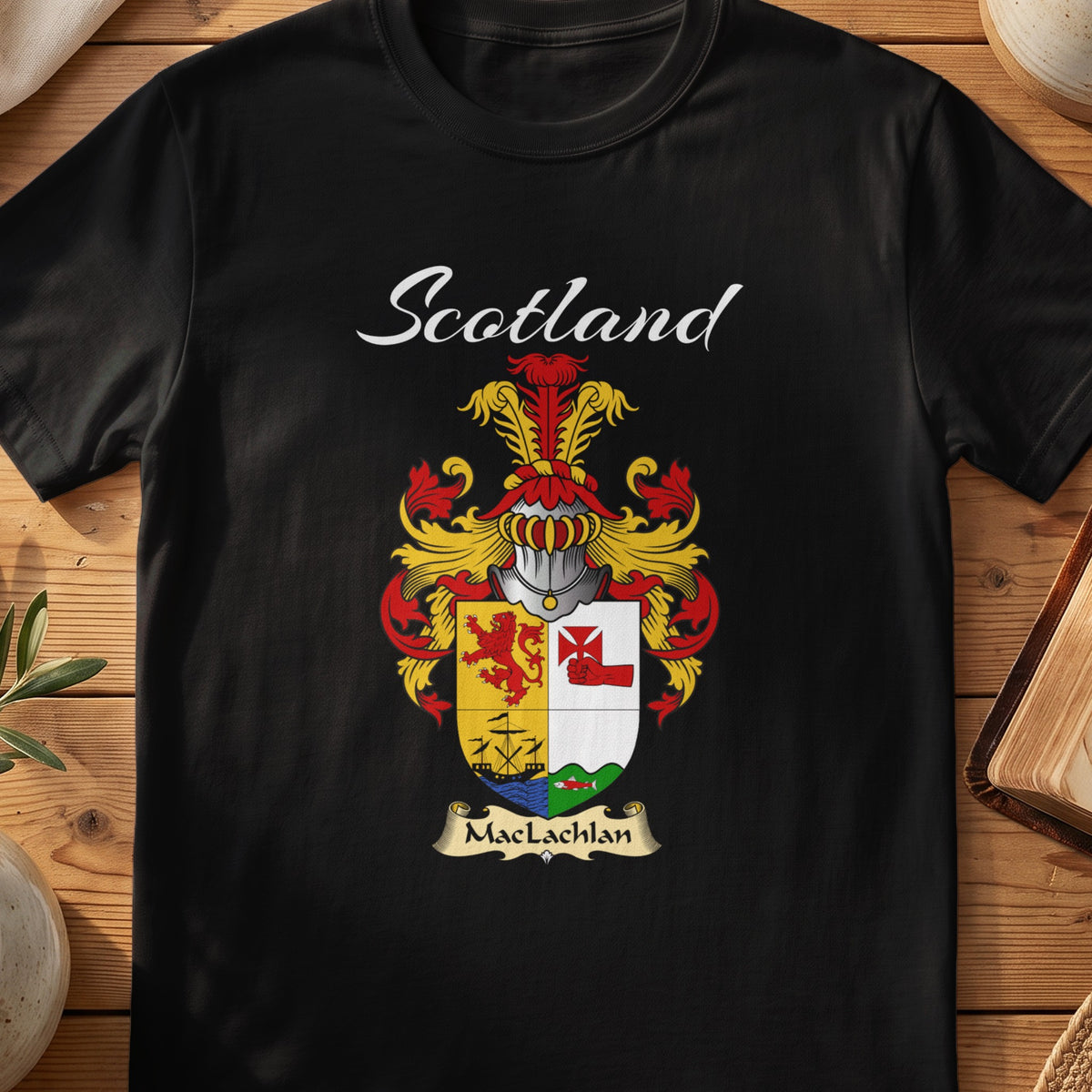 Black MacLachlan Scottish T-shirt featuring a quartered shield with a lion and sailing ship
