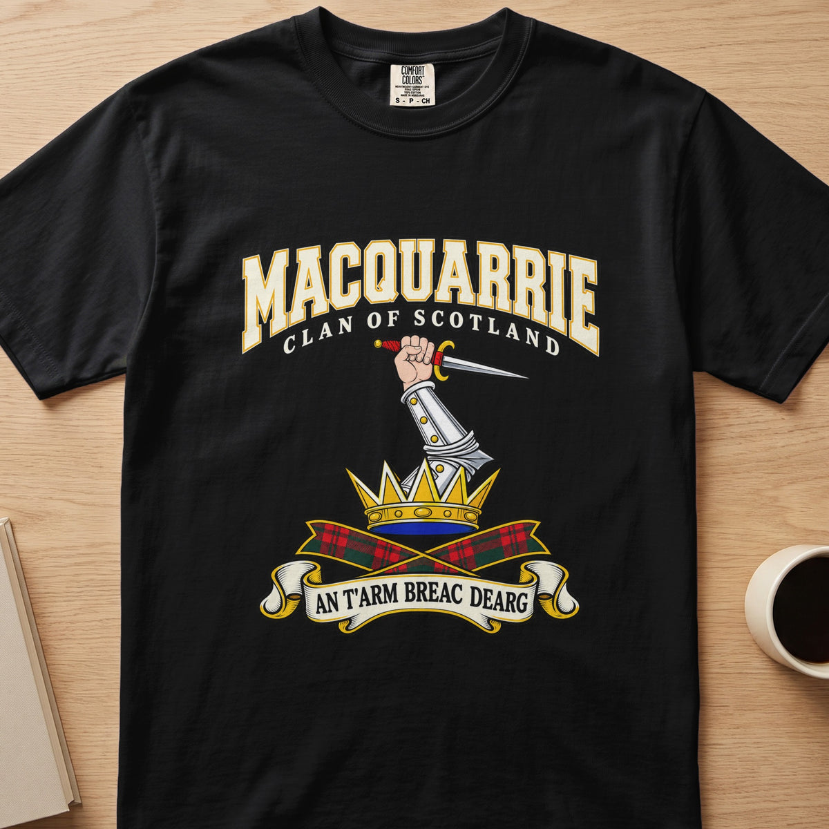MacQuarrie clan T-shirt in black, front view with armored arm holding a dagger above a crown
