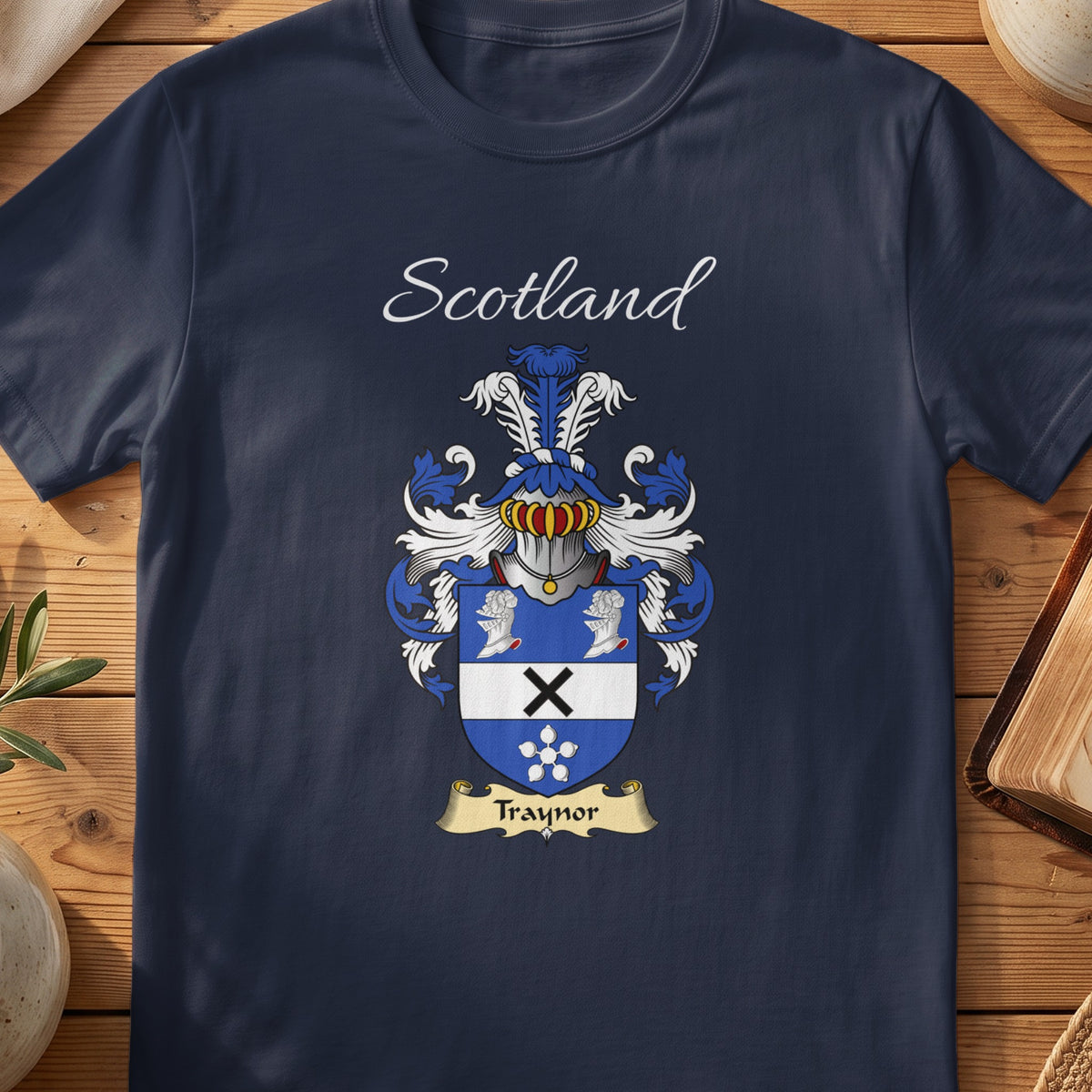 Navy Traynor heritage T-shirt laid flat with “Scotland” and the colourful family shield design.