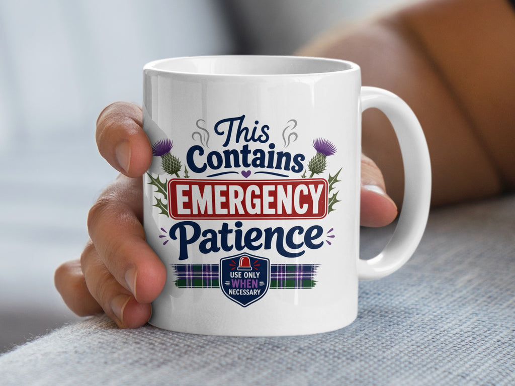 White mug with "This Contains EMERGENCY PATIENCE" text and plaid design.