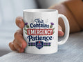White mug with "This Contains EMERGENCY PATIENCE" text and plaid design.