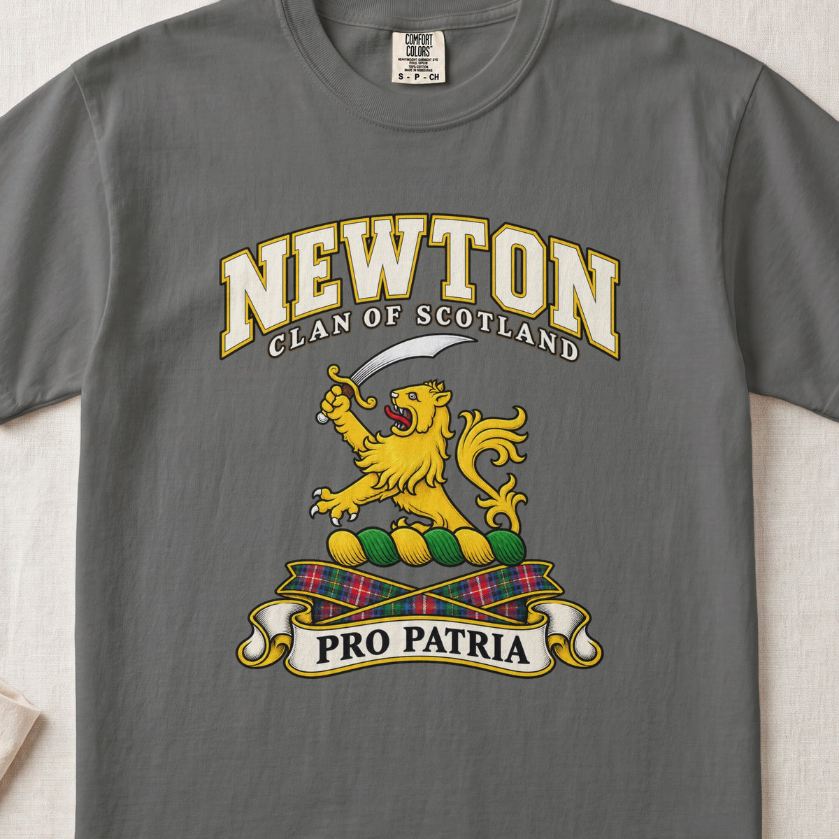 Newton Scottish clan T-shirt in Pepper, front view with a gold lion holding a curved sword and motto banner.
