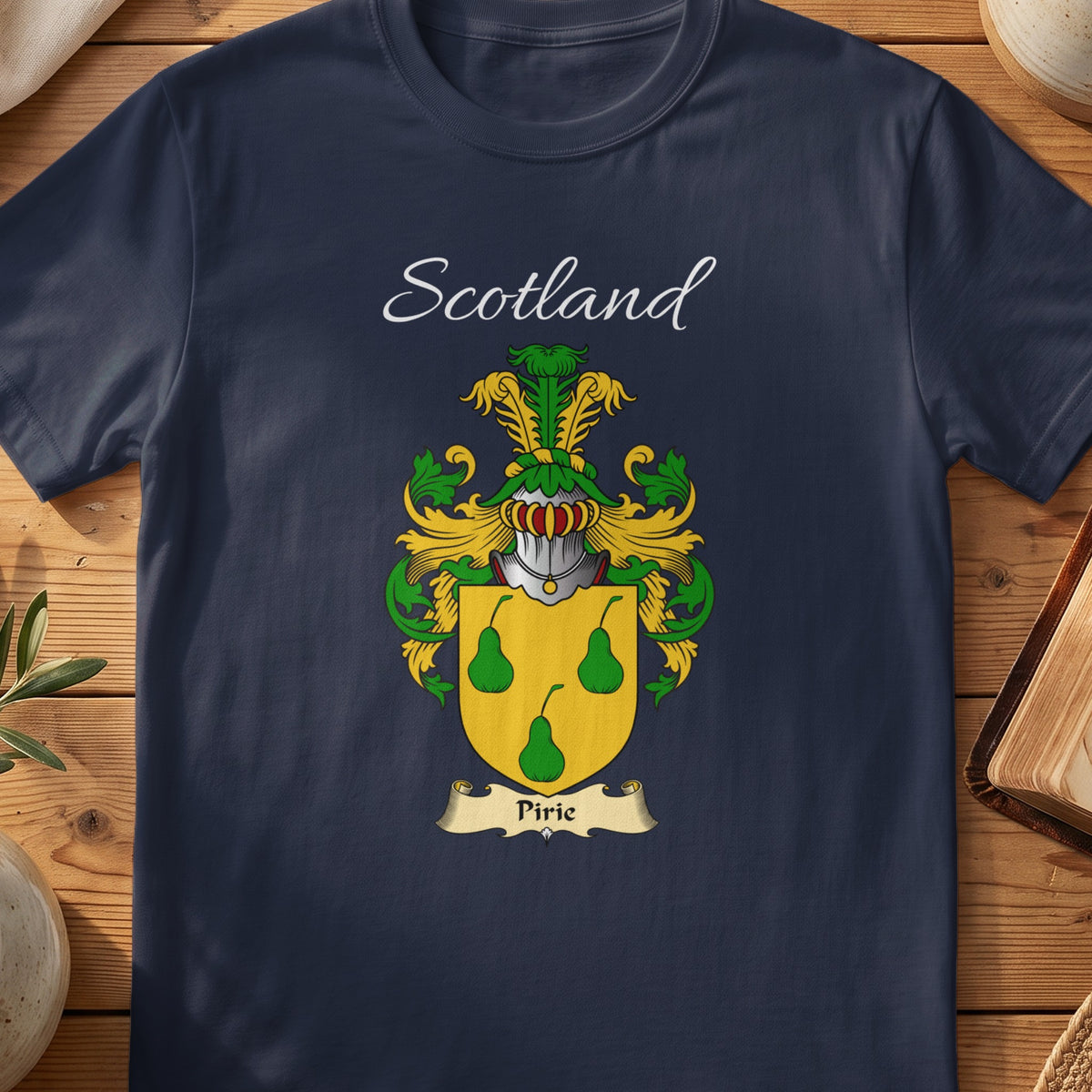 Navy Pirie heritage T-shirt laid flat with “Scotland” and the colourful family shield design.