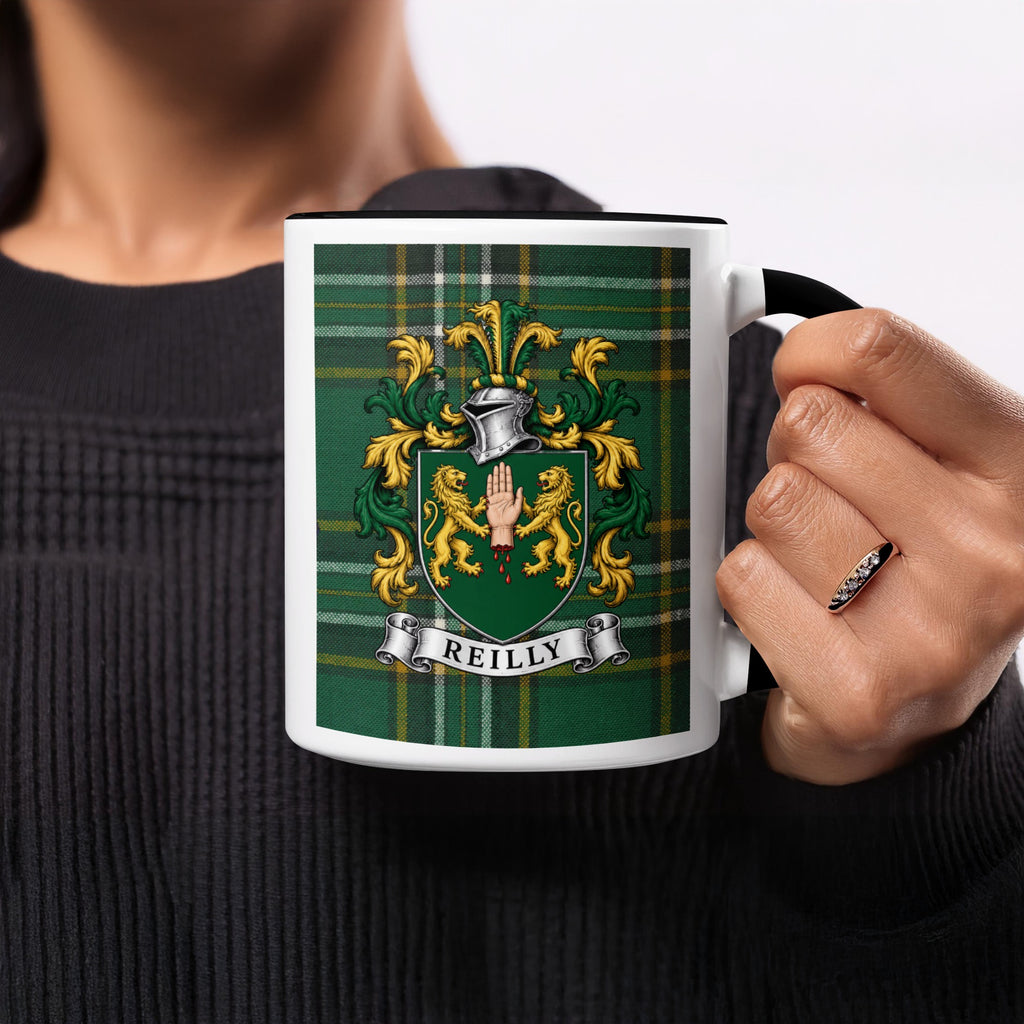 Reilly family crest on Irish National Tartan 11 oz ceramic mug, close-up view