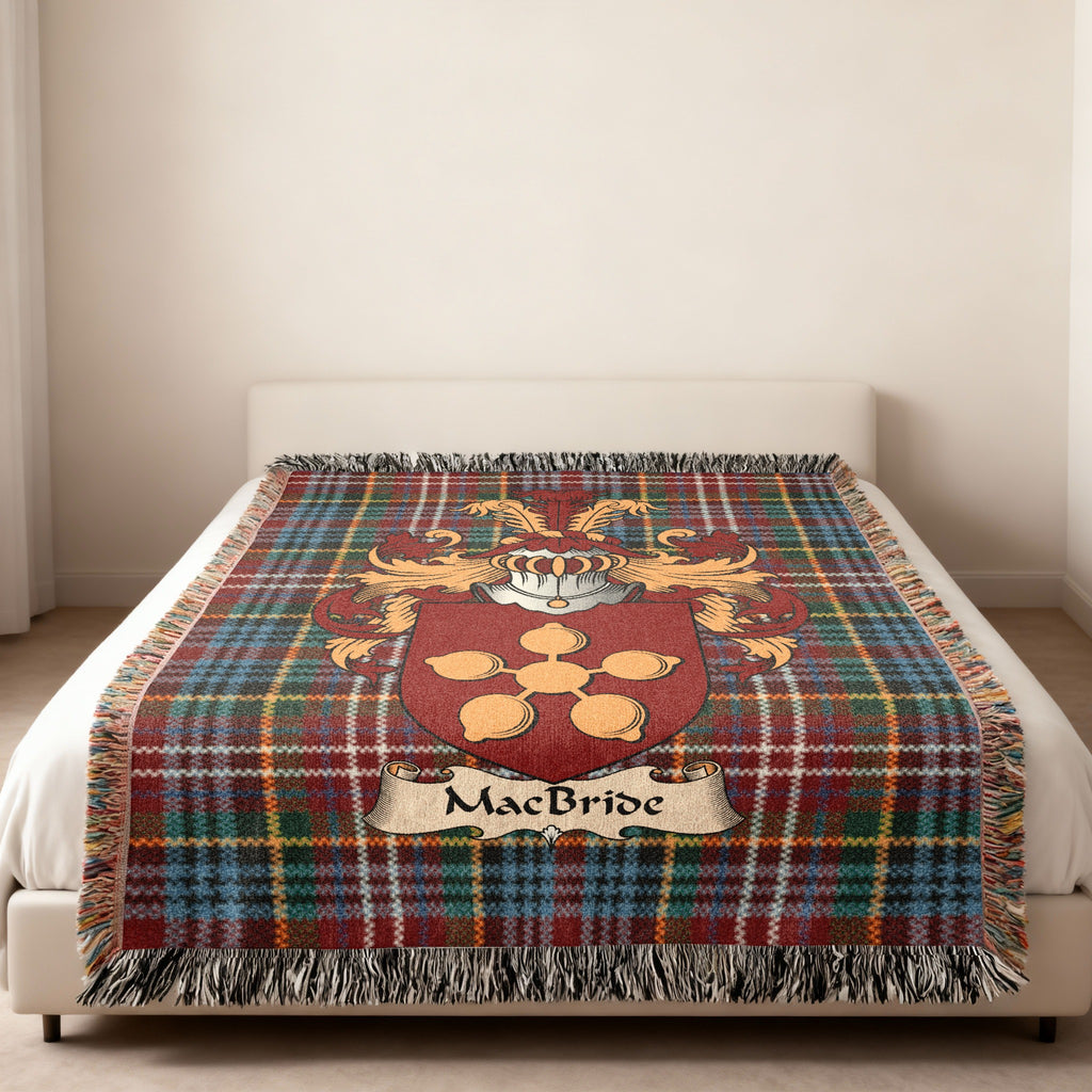 MacBride Scottish family shield woven blanket on a Caledonia tartan background