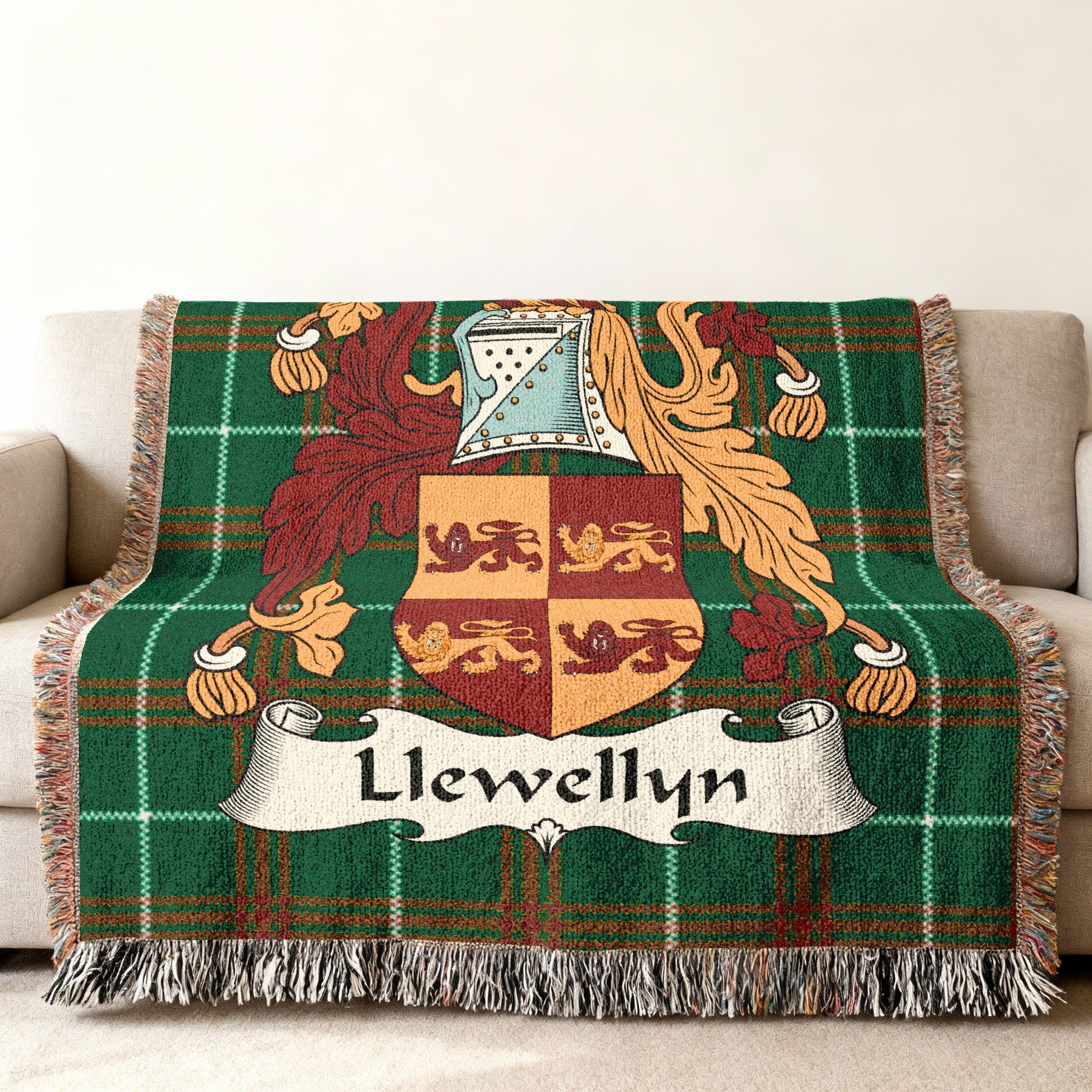 Llewellyn crest woven blanket on a couch.