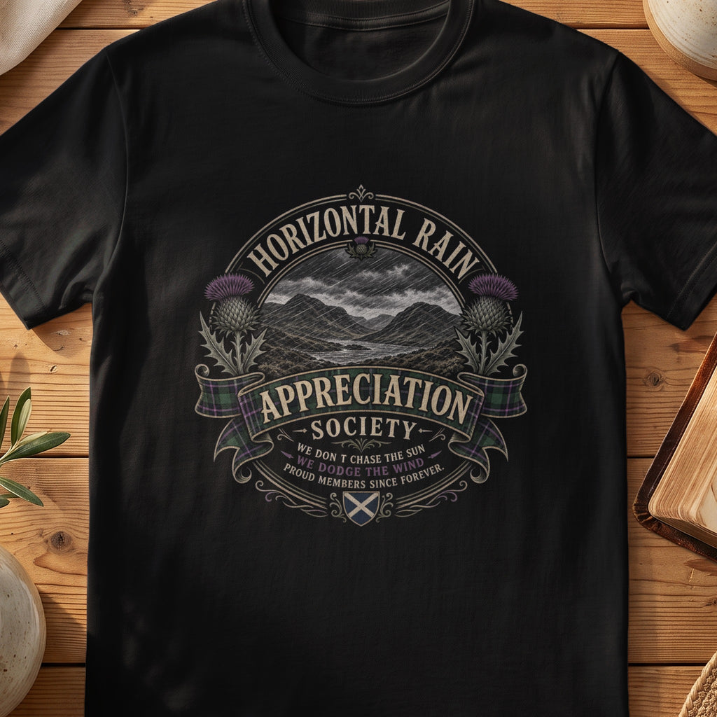 Black Gildan 64000 unisex T-shirt flatlay with Horizontal Rain Appreciation Society Scottish graphic design