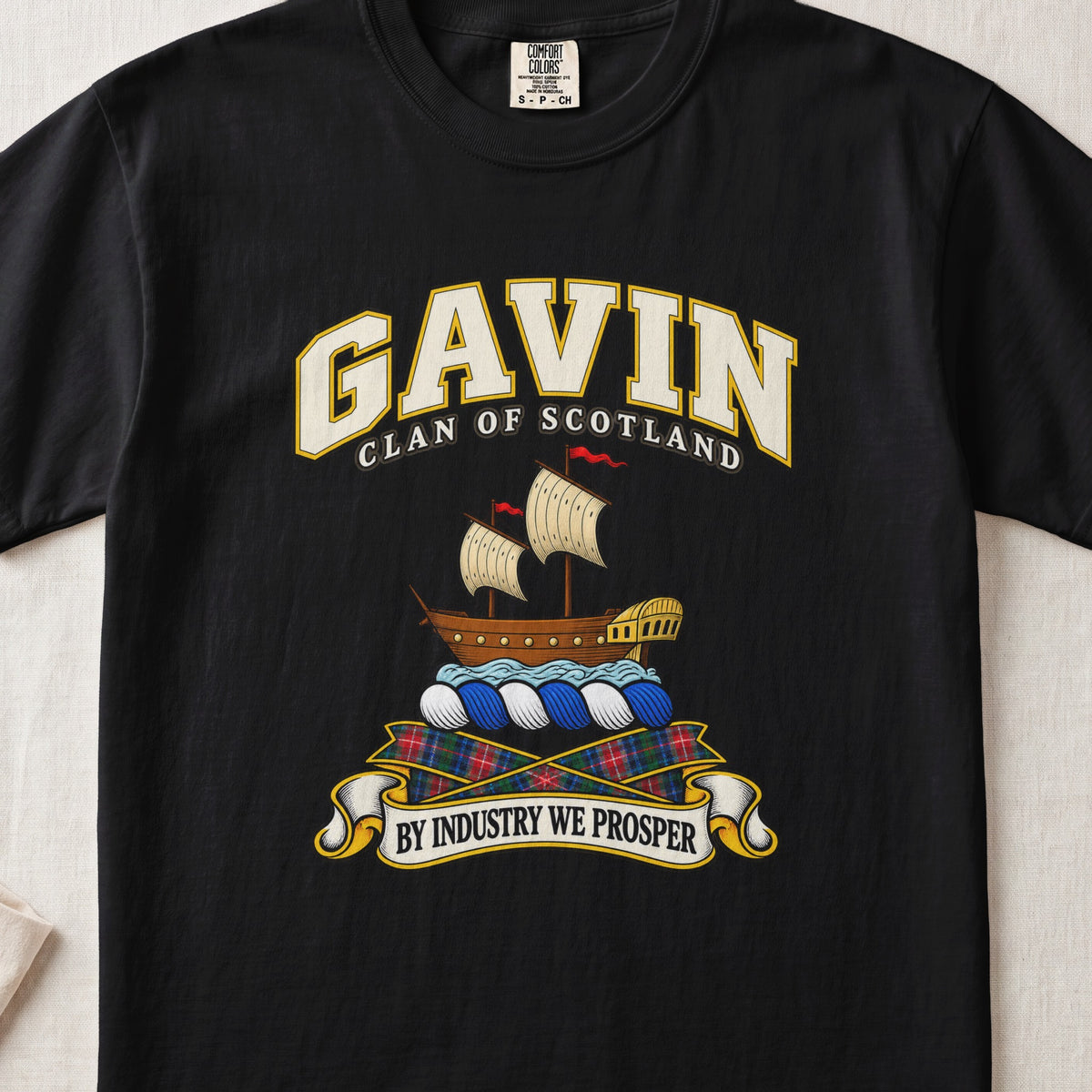 Gavin Scottish clan T-shirt in Black, front view with a sailing ship on blue waves and motto design.