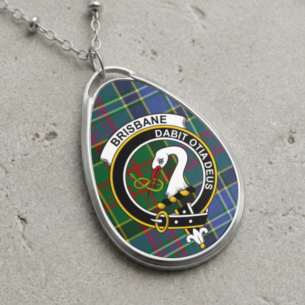 Brisbane clan Scottish tartan necklace with clan crest and Dabit Otia Deus motto on tartan background