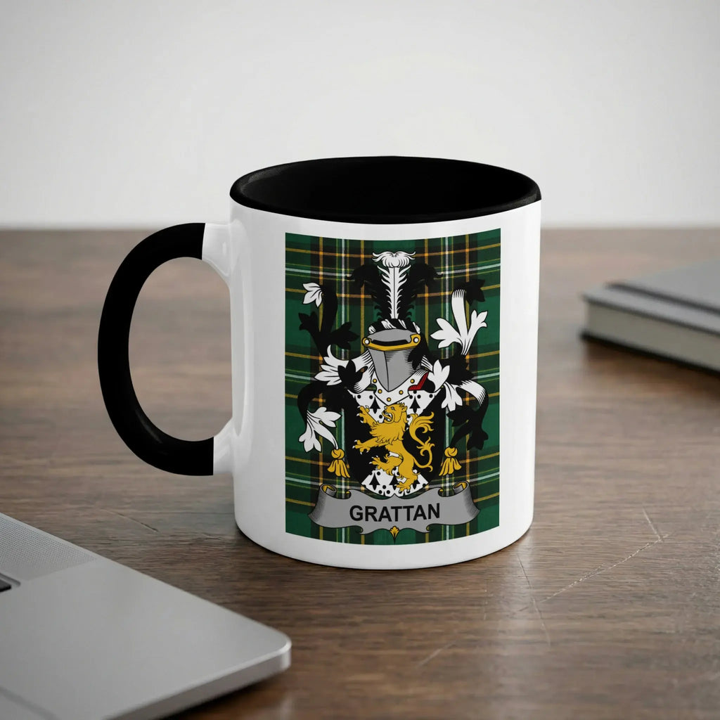 White mug with black rim displaying a green coat of arms with "GRATTAN" text.