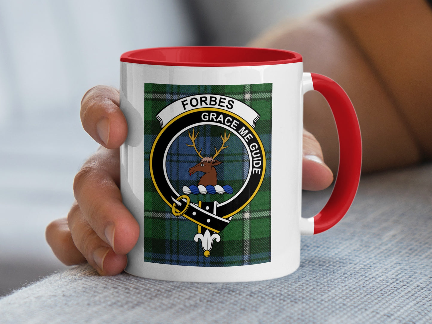 Forbes clan crest on a mug with red handle and rim.