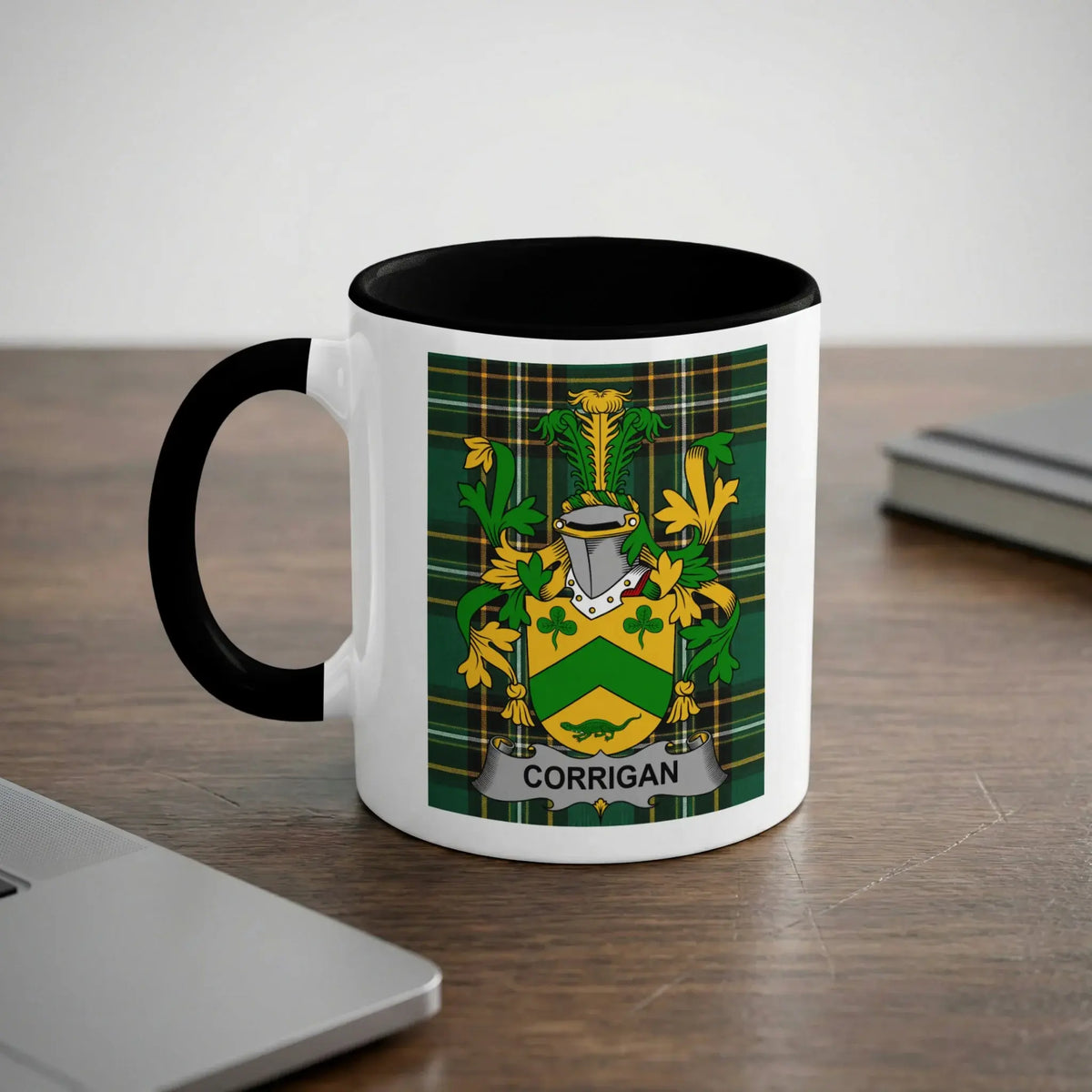 Corrigan 11oz ceramic mug with black rim and surname emblem on Irish tartan.