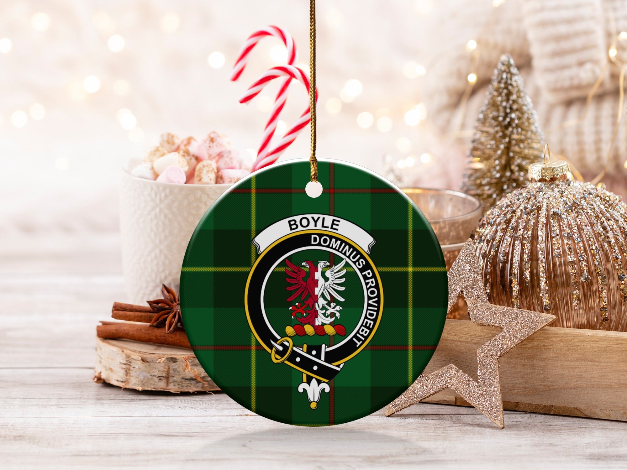 Boyle clan tartan ceramic ornament on table with Christmas decor