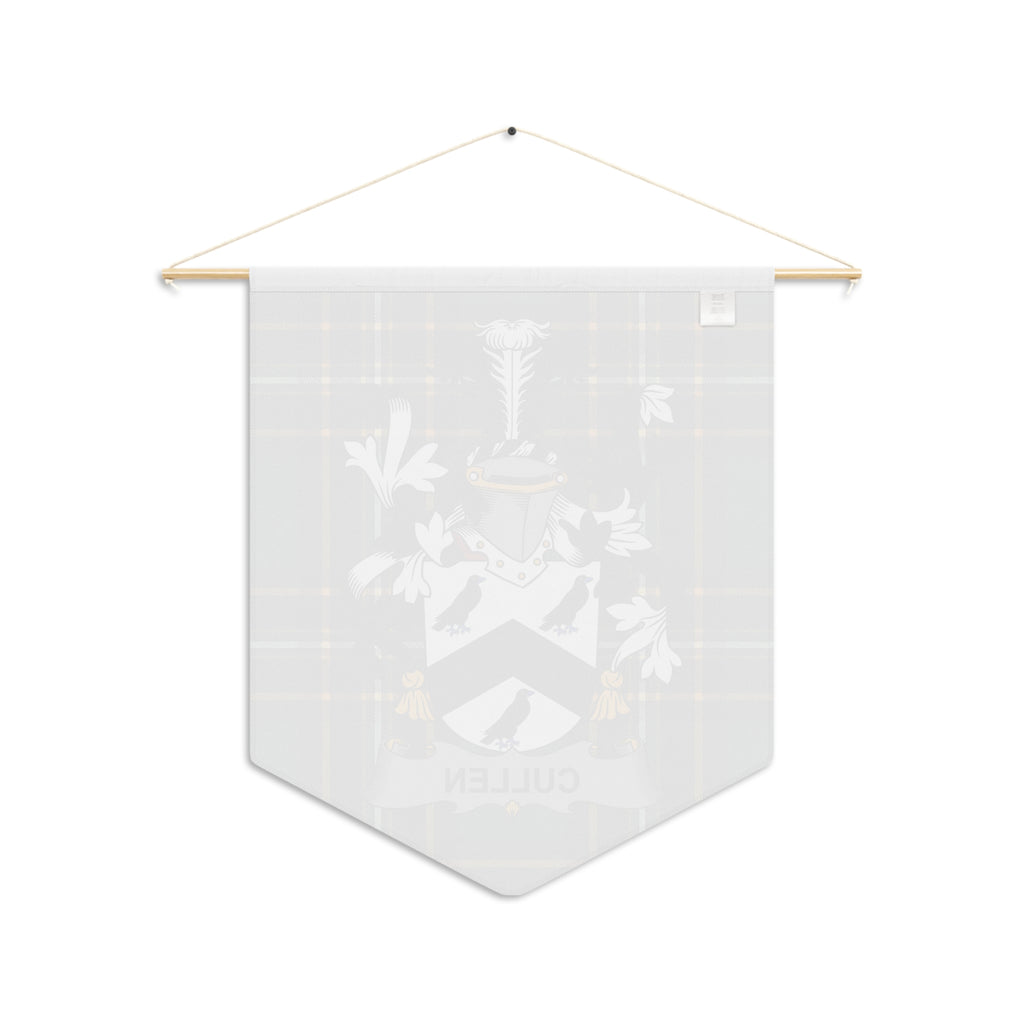 Cullen family crest pennant hanging from a wooden dowel and string.
