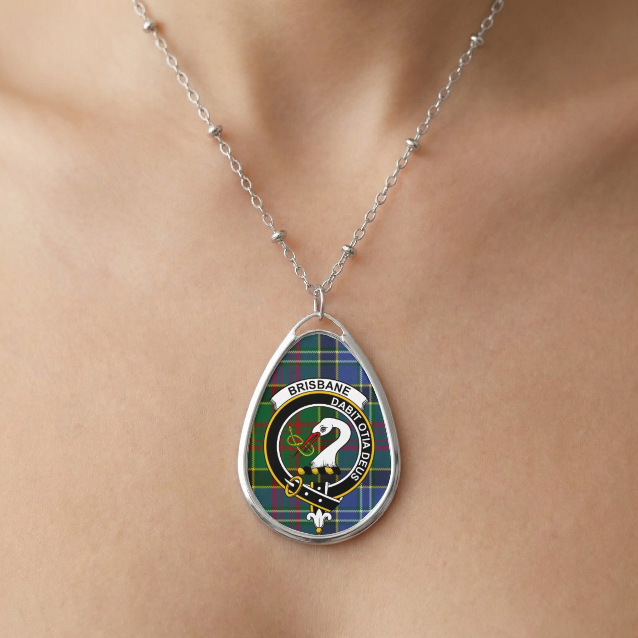 Close-up of Brisbane clan tartan pendant necklace with crest design