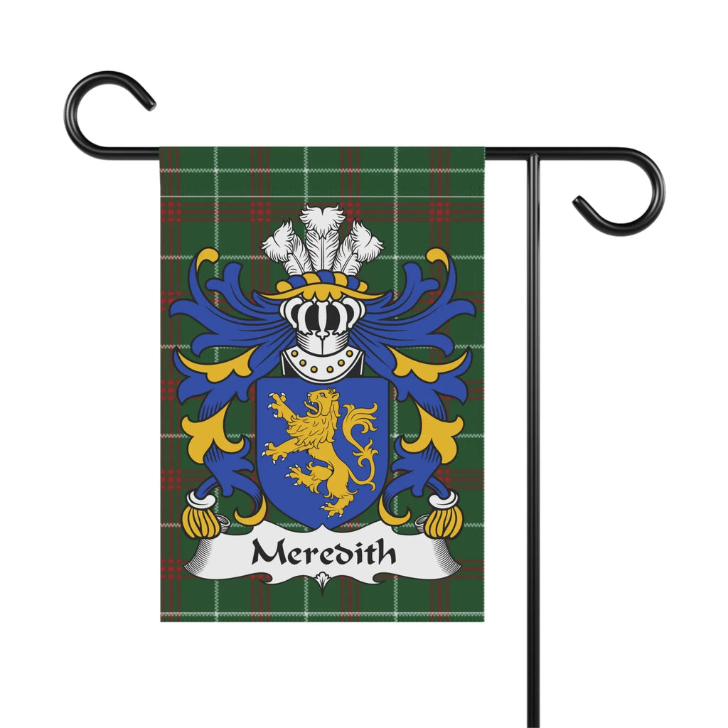 Meredith family crest on a green plaid garden flag.