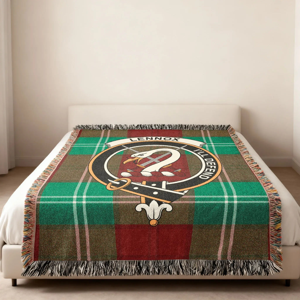 Clan Lennox tartan woven blanket — folded view showing fringe detail and I'll Defend crest