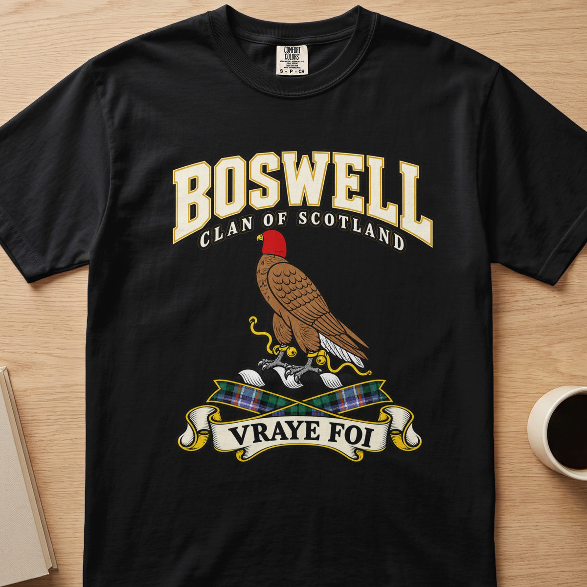 Boswell clan crest with hooded brown bird on a black Comfort Colors T-shirt, front view