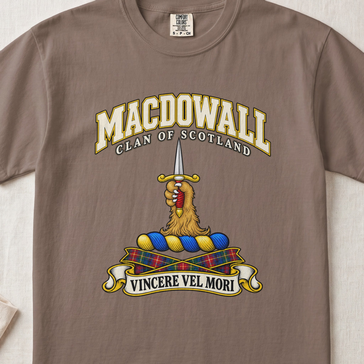 MacDowall Scottish clan T-shirt in Espresso, front view with a golden paw holding an upright dagger and motto banner.