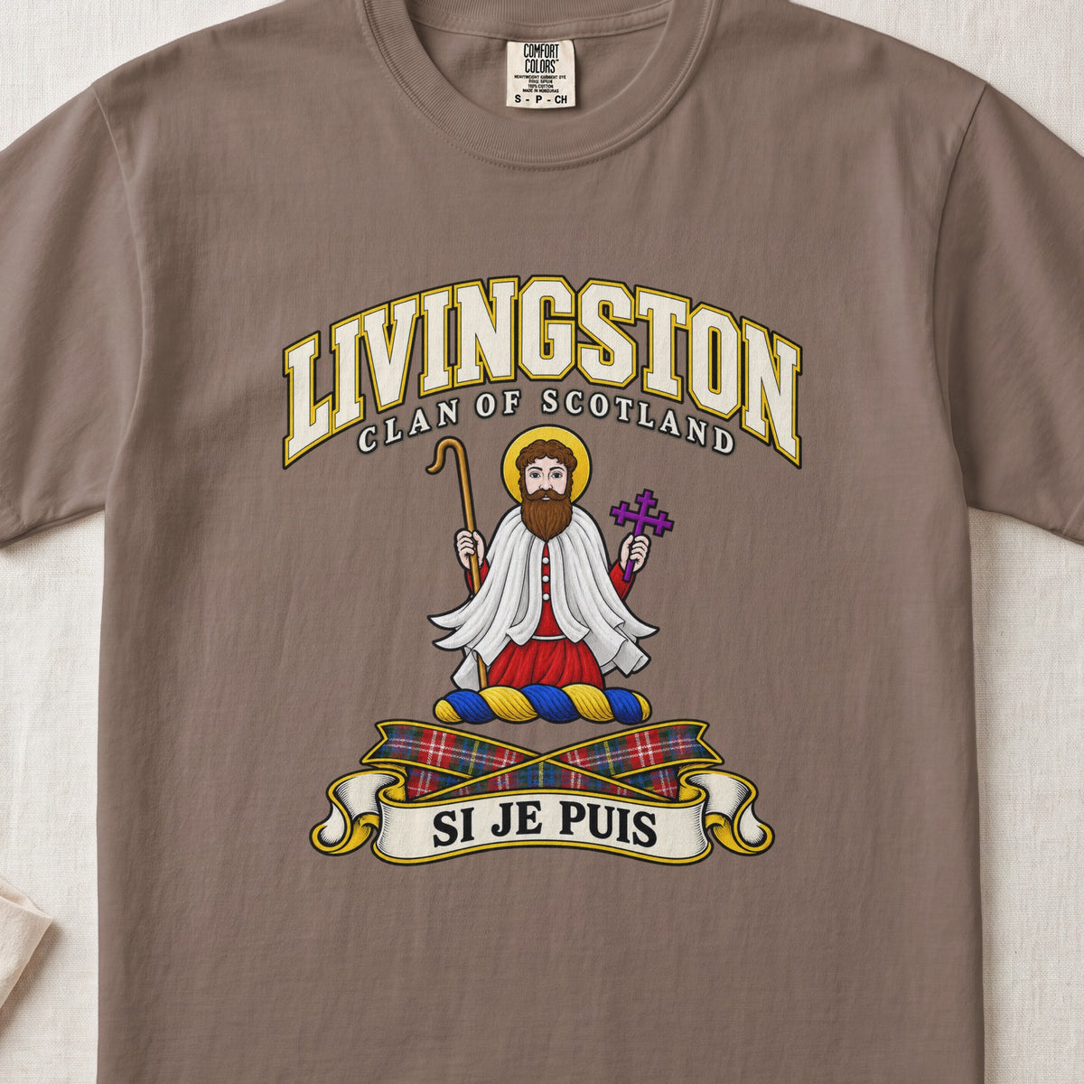 Livingston Scottish clan T-shirt in Espresso, front view with a robed figure with a golden halo and motto design.