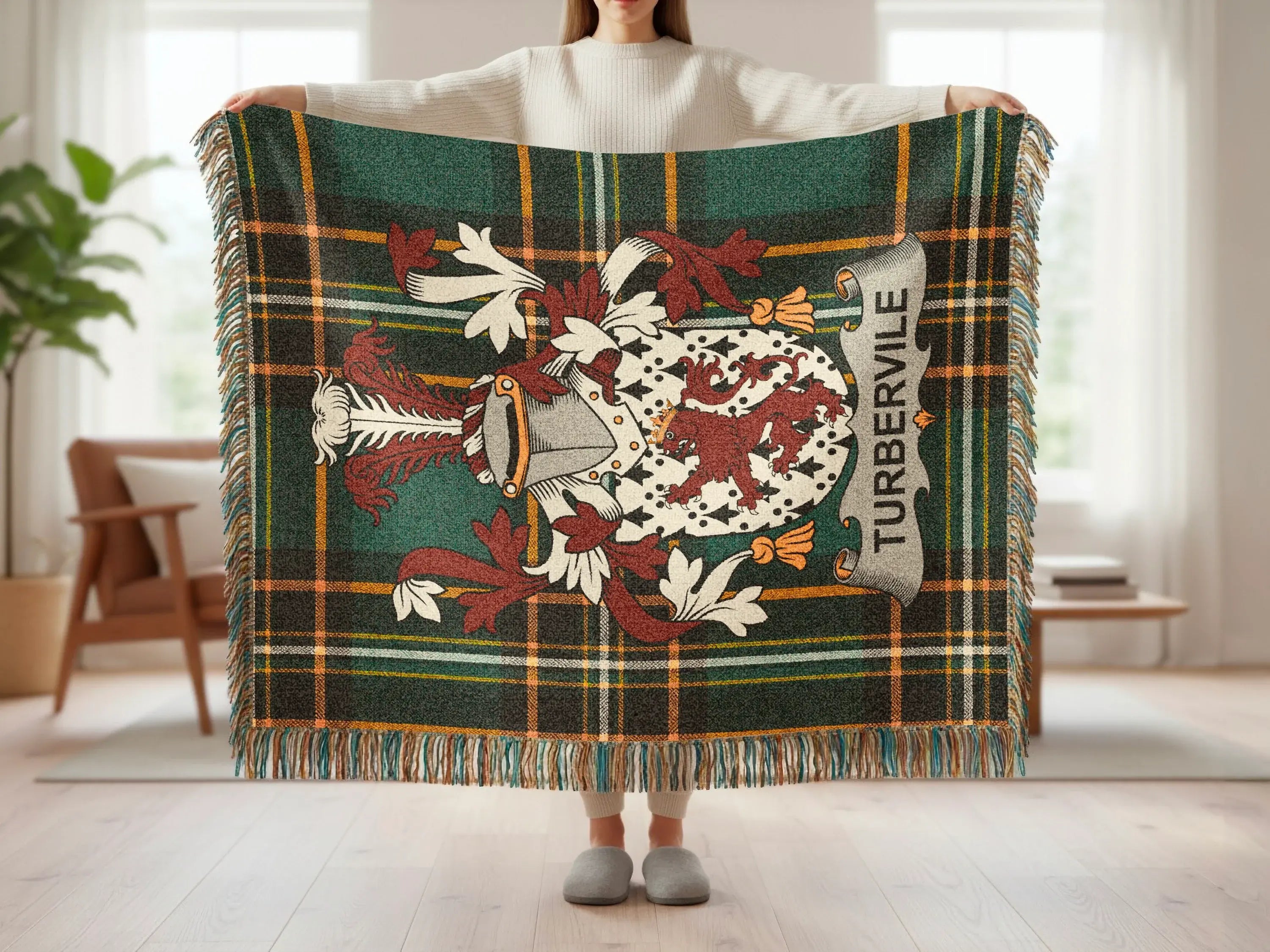 Tartan blanket with a crest featuring a lion and "Turberville" text.