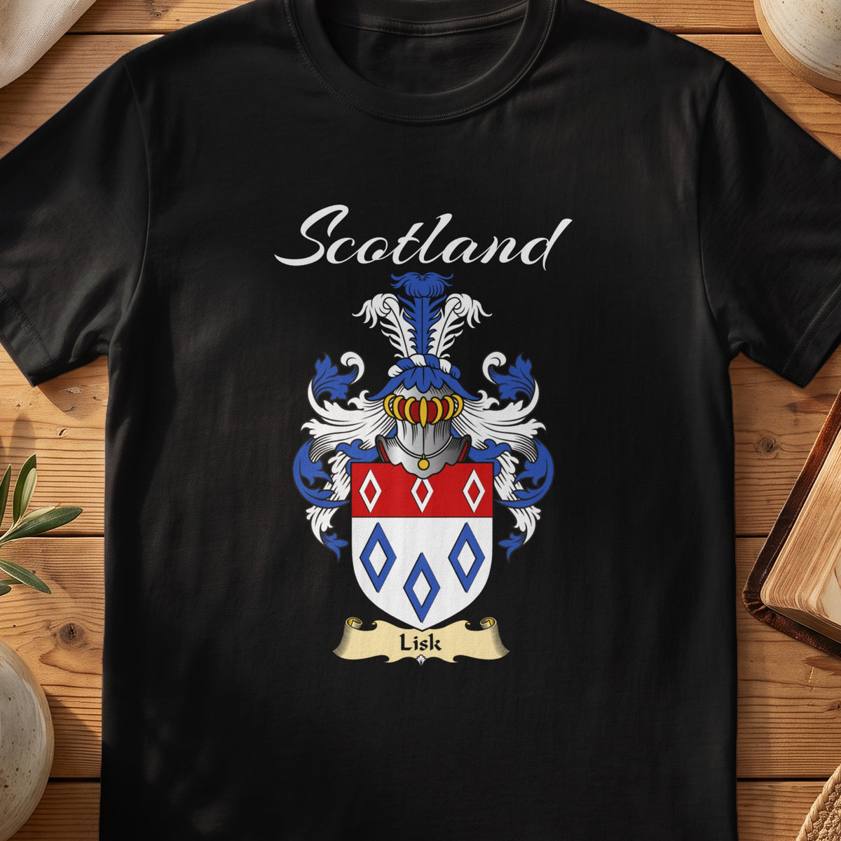 Black Lisk Scottish T-shirt featuring red-and-blue diamond outlines on a pale shield