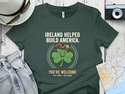 Green t-shirt with shamrock saying "Ireland Helped Build America. You're Welcome."