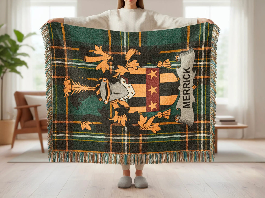 Tartan blanket with Merrick family crest and fringe.