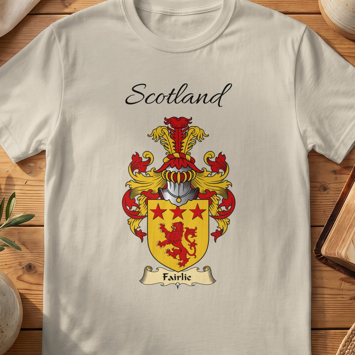 Sand Fairlie Scottish family shield T-shirt featuring a red lion and red stars on gold