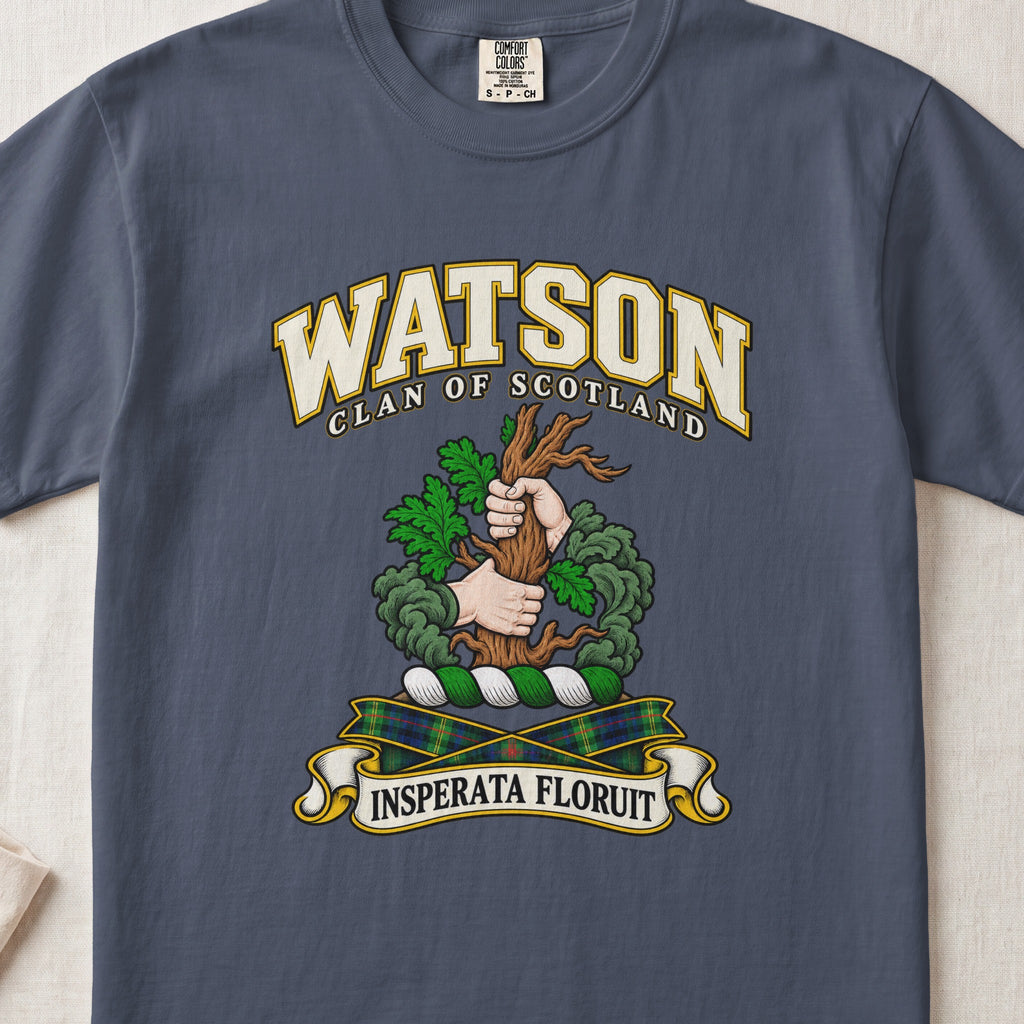 Watson Scottish clan T-shirt in Midnight, front view with two hands gripping a tree trunk with green foliage and motto banner.