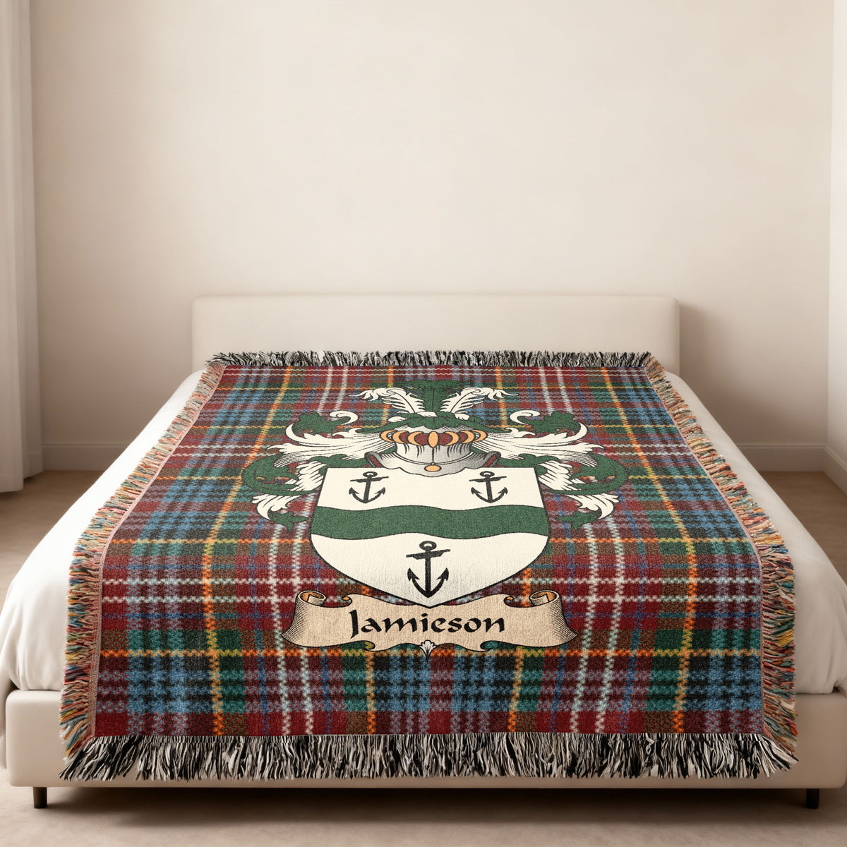 Jamieson Scottish family shield woven blanket on a Caledonia tartan background