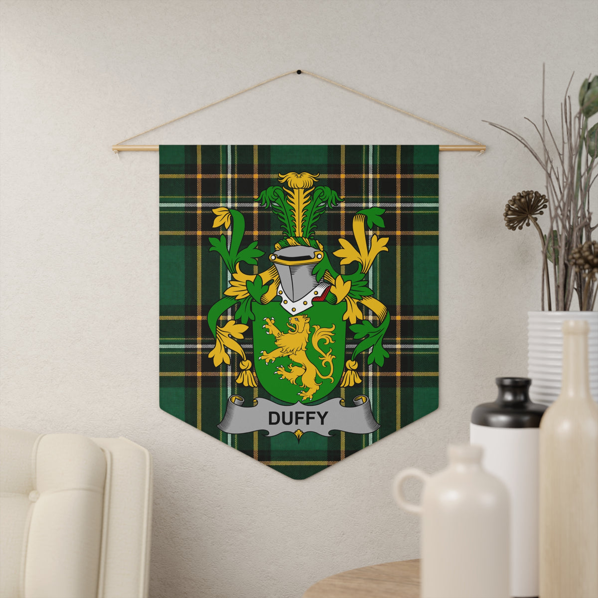 Duffy family crest on green tartan banner hanging on wall.